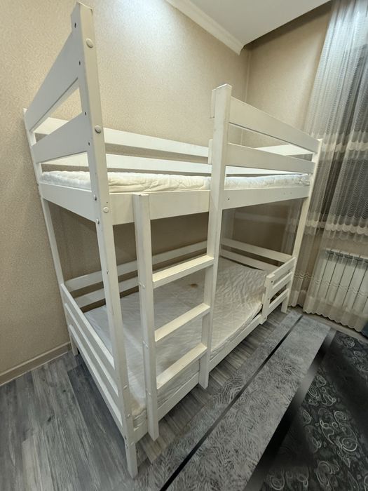 Двухярусная детская кровать