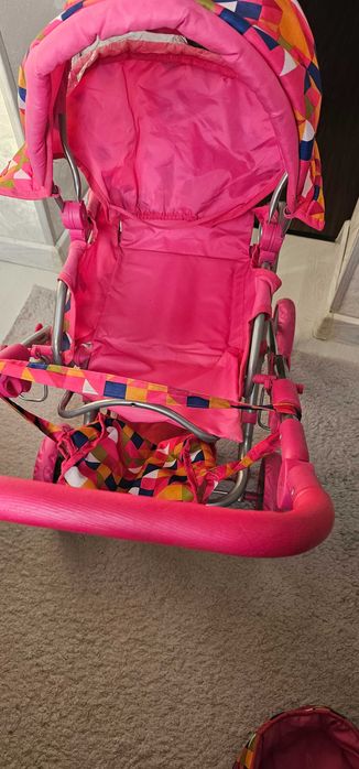 Игрушечная детская коляска