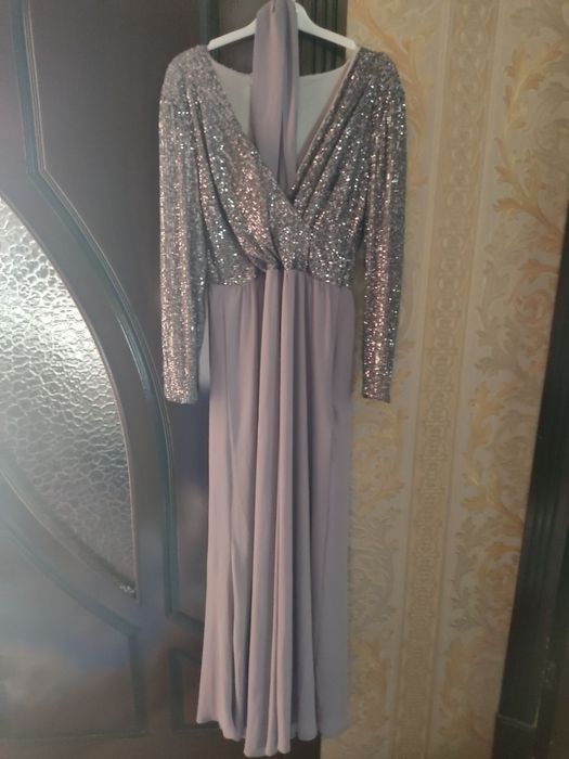 Vecherniy koylak 46 uzb razmer turk raer 40-42 ga keladi.