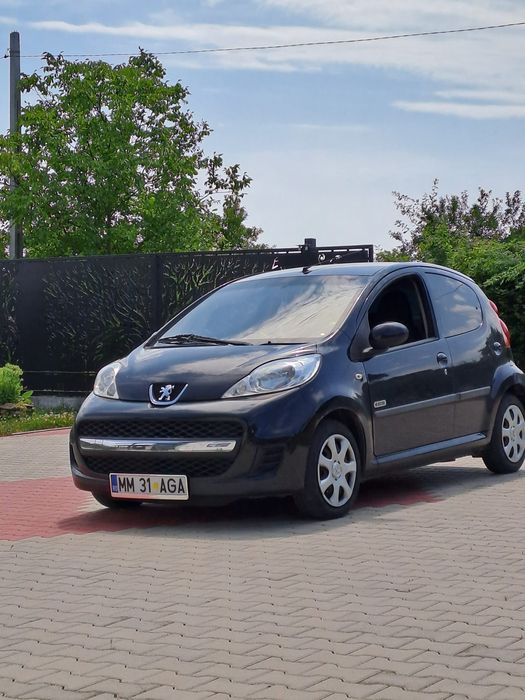 Vând Peugeot 107