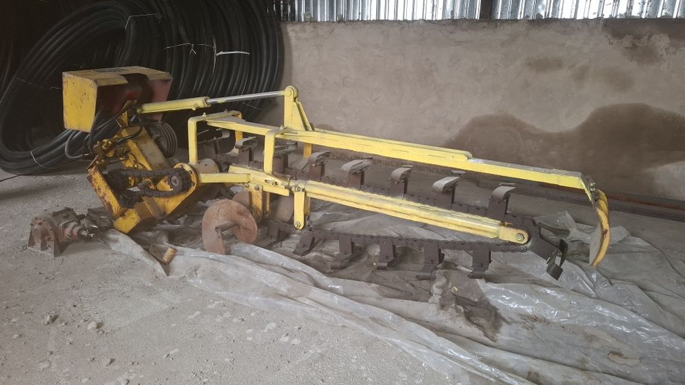 Цепной траншеекопатель