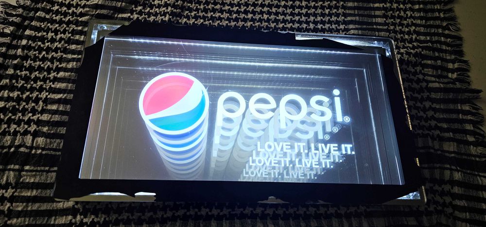 reclama luminoasa pepsi