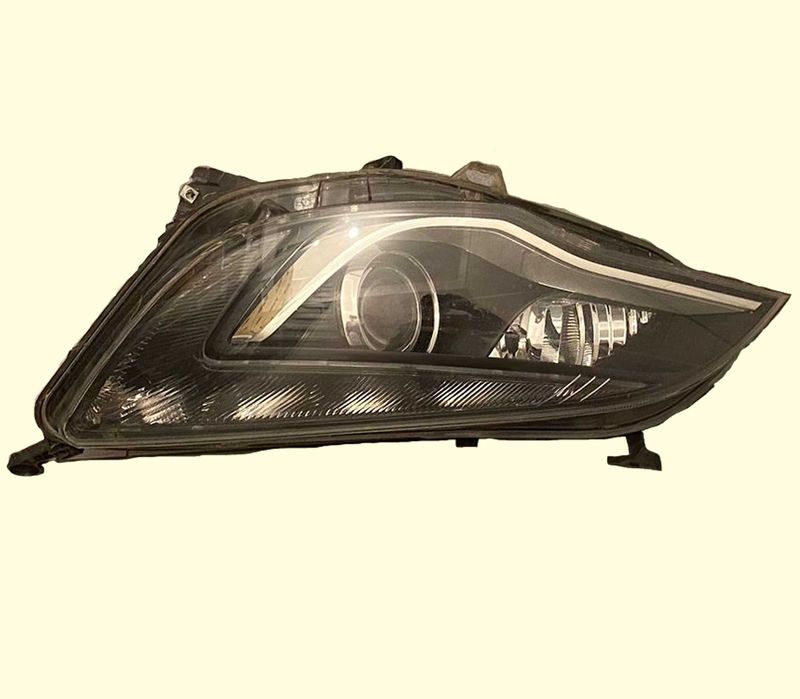 Far stanga bi-xenon adaptiv Opel Astra J 2009-2012