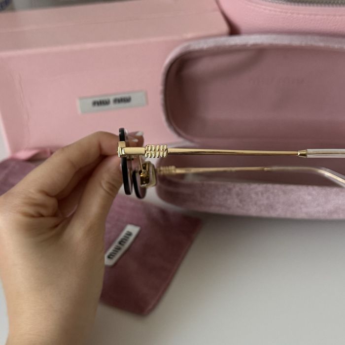 Овални очила MiuMiu