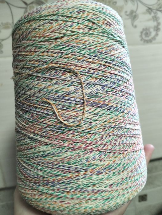 Пряжа в бобине .