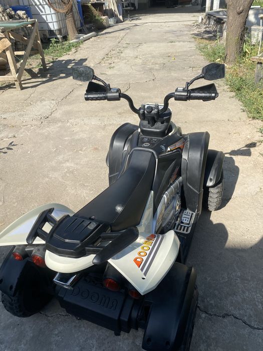 Детская машина DOOMA