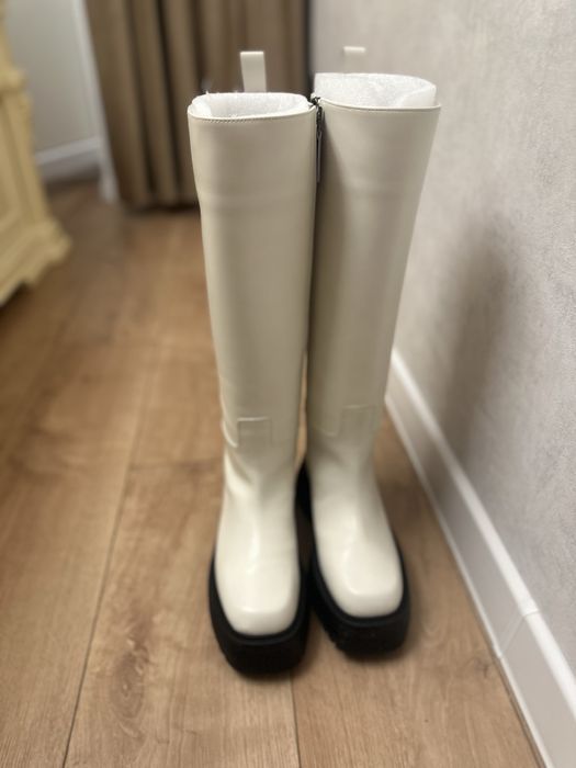 Продам сапоги новые