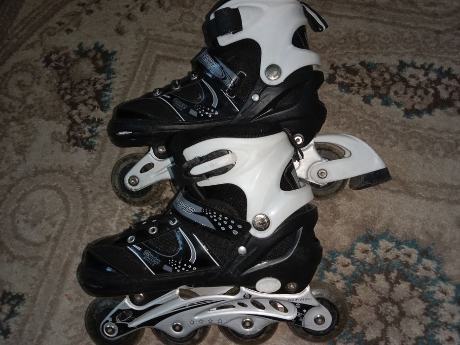 Роликовые коньки