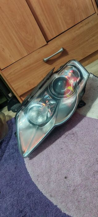 Faruri bixenon cu functia cornering VW Passat b6