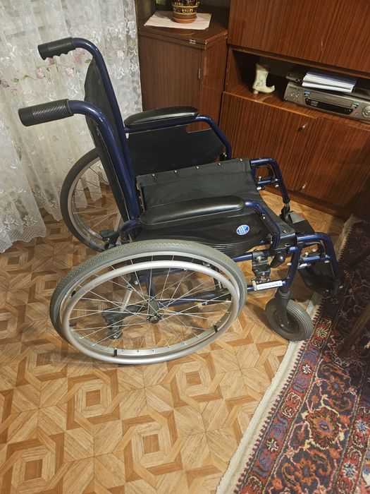 Инвадидная коляска