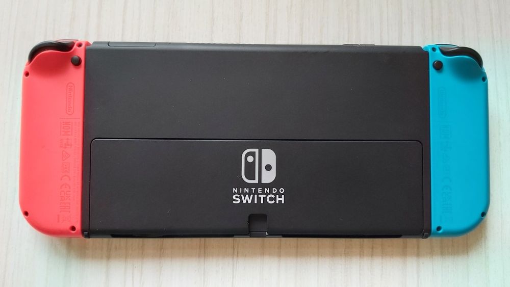 Consola Nintendo Switch OLED - pachet complet + 2 jocuri la alegere