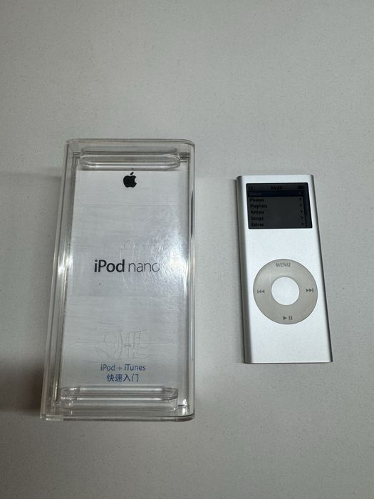 Оригинален Apple iPod Nano 2nd Generation 2GB (A1199) Сребрист – С кутия и слушалки (с качена музика)