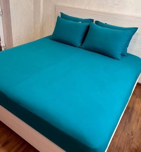 Трикотажные простыни на резинке