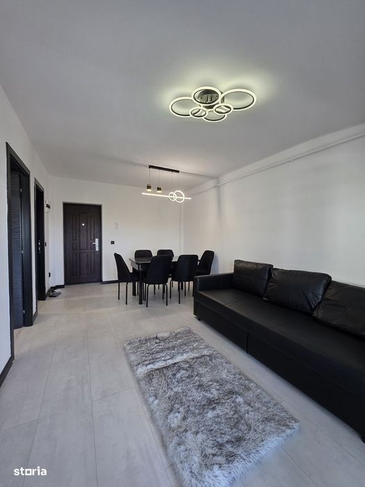 Apartament bloc nou,parcare proprie, mobilat.