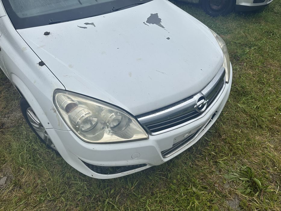 Capotă bară faruri haion  motor Astra H