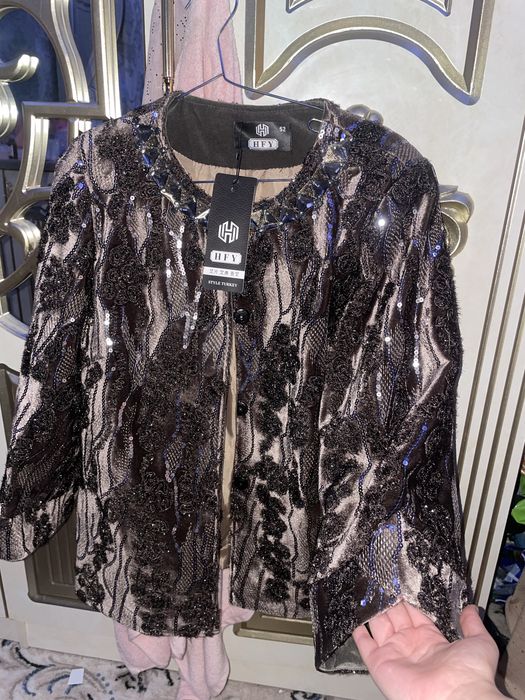 Yangi kostyum kiymagan