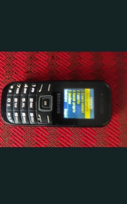 Telefon mobil cu taste in bună stare de funcționare, bateria a fost schimbată.