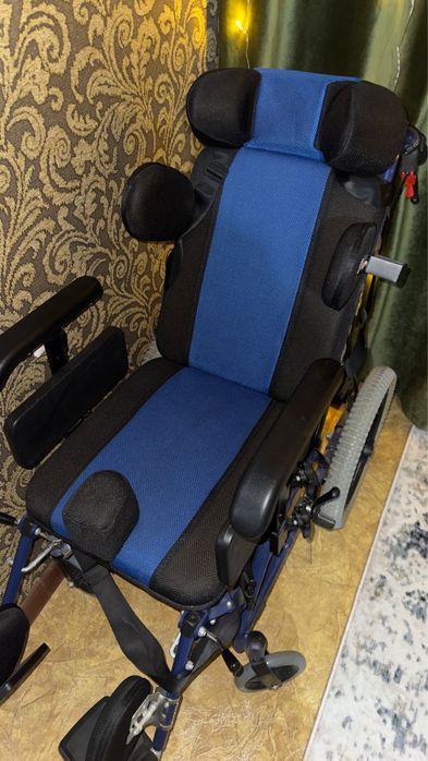 Инвалидная коляска для детей с ДЦП