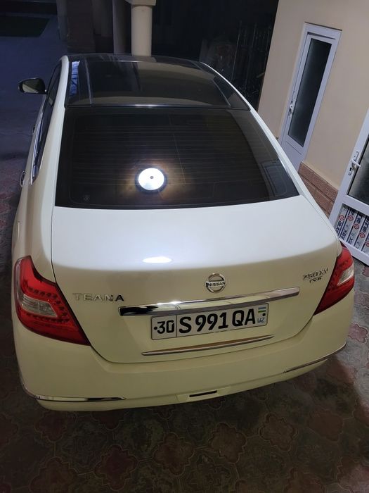 Ниссан тяна 2009