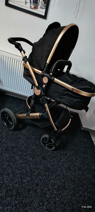 Vand carucior reversibil, suspensii, cu landou si scoica aproape nou