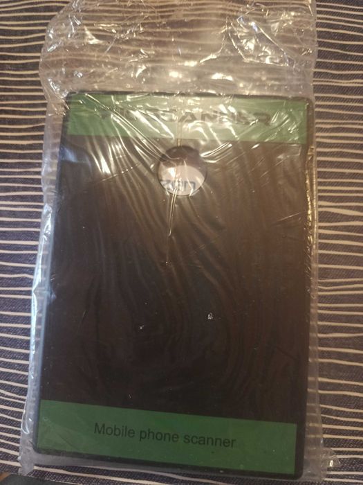 Мобилен скенер за филми и диапозитиви