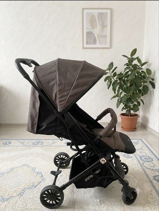 Продам легкую прогулочную коляску Ining Baby (серая)