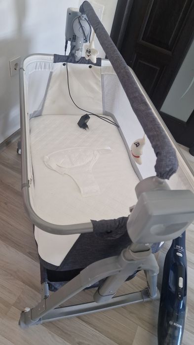 Patut electric  pătuț electric multifuncțional pentru bebeluși de tip co-sleeper  CLD Care Love Devotion.