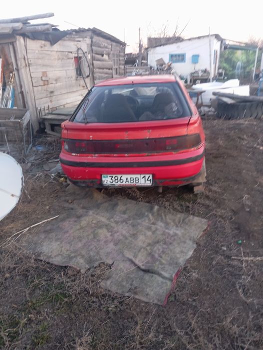 Продам Мазду 323..