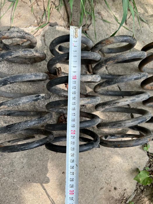 Ось для прицепа автомобиля.