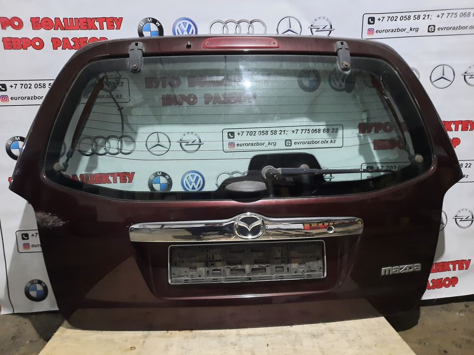 Крышка багажника Мазда Требьют