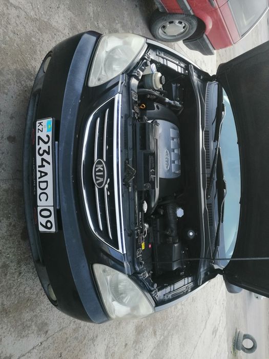 Продам Кия каренз