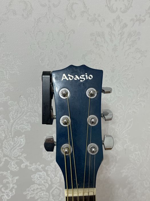 Гитара адасио в комплекте кападастер