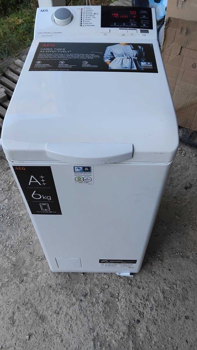 Пералня AEG с горно зареждане