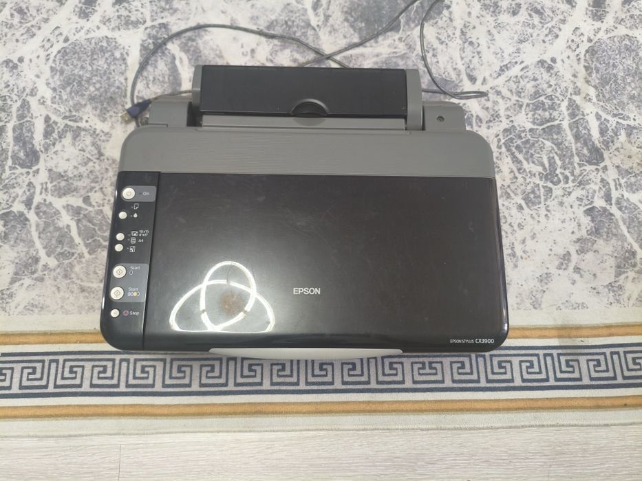 Принтер марки EPSON CX3900