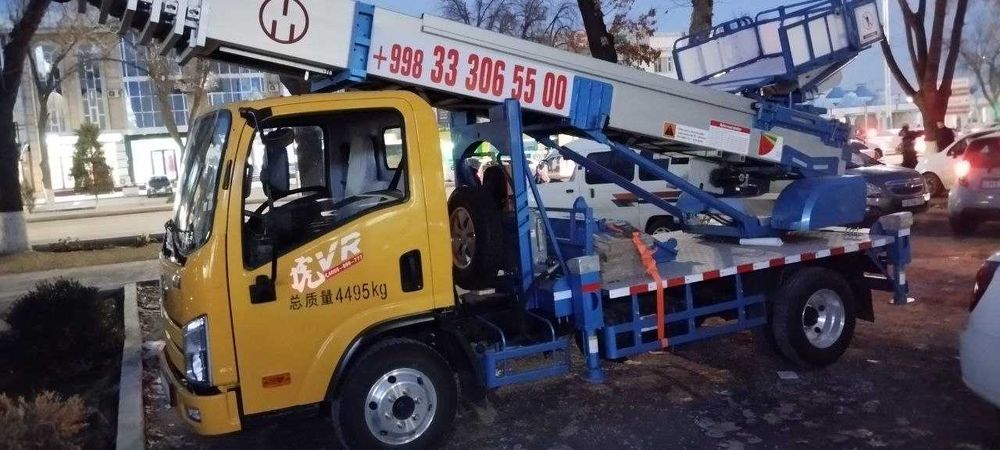 Автолифт юкори каватларга юк чикариб бериш (автовышка, мобильный лифт)