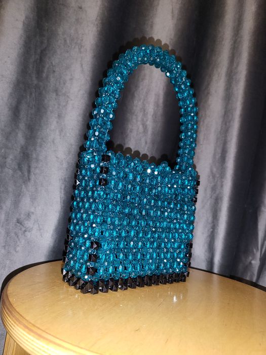 Красивая сумочка с бантиком приятного цвета