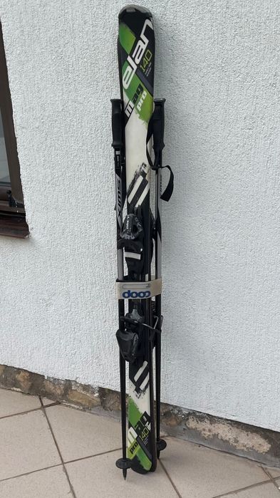 Schiuri Elan Pro 140 cm + bețe SWIX + Clăpari Nordica Firearrow Team 2 (mărimea 235 / 23.5 MP) - set complet