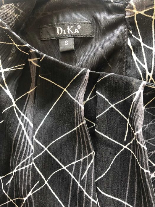 елегантен дамски топ DIKA