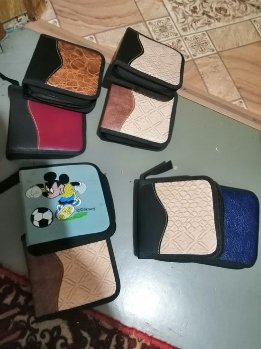 Продам папки с кармашками под диски