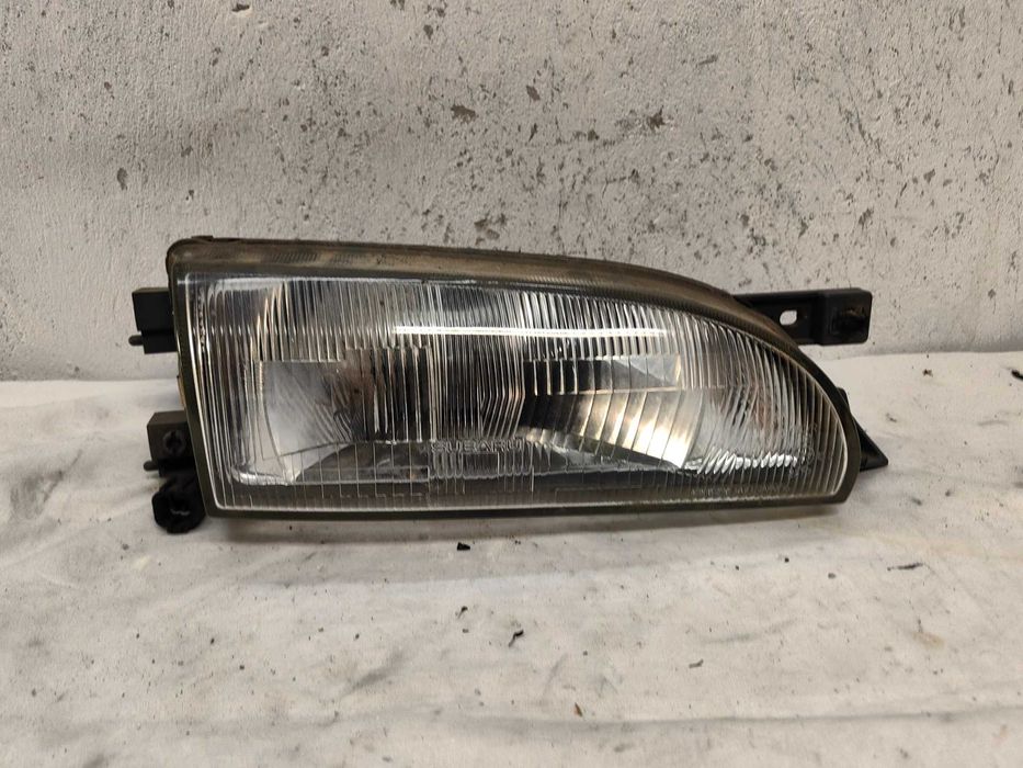 Оригинален фар Субару  Subaru Impreza 92-01