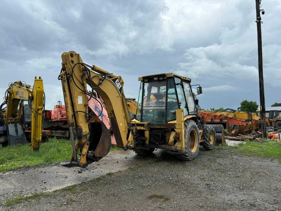 Dezmembrez buldoexcavator Caterpillar 428D-piese de schimb Caterpillar