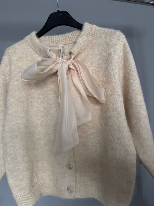 Жилетка с вълна и панделка