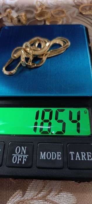 Золотоя цепочка, змейка,проба 585, вес 18,54 длина 60 см,фирма мидас.