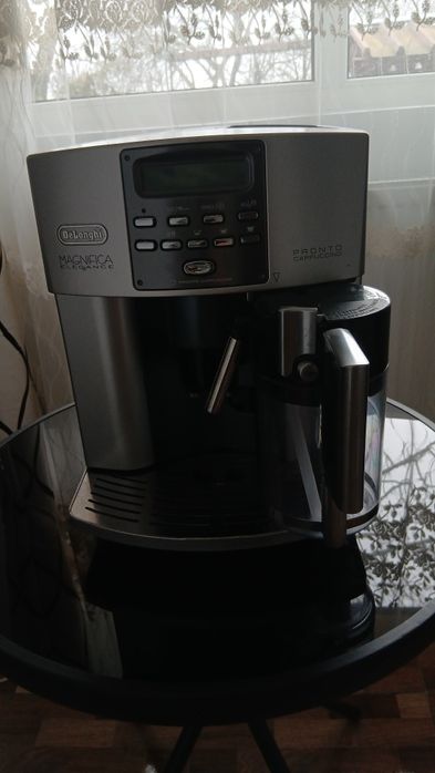 Aparat cafea  delonghi .cafea boabe si macinata