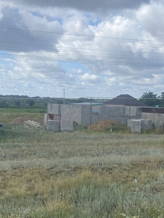 Продам участок с недостроенным домом