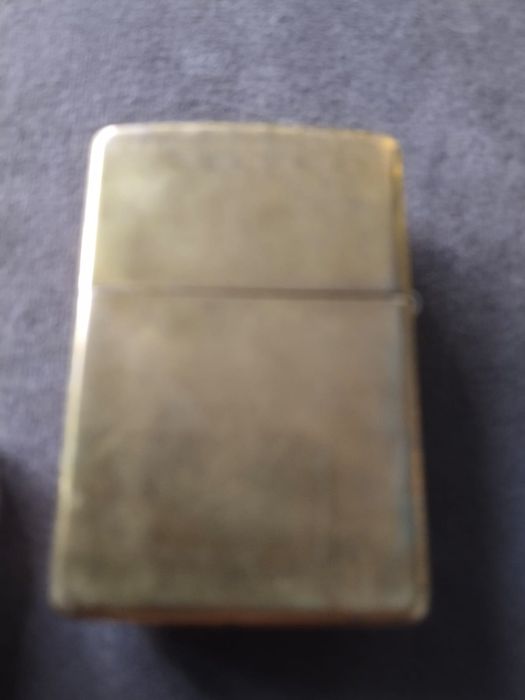 Зажигалка Зиппо с чехлом.