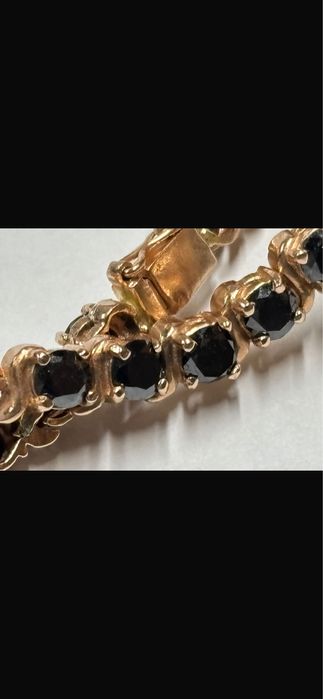 Brățara de  aur cu diamante negre