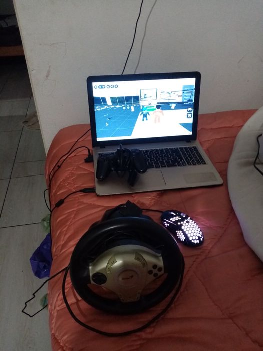 Vand laptop maneta pt ps 2 si volan sau schimb cu cross de 49cc