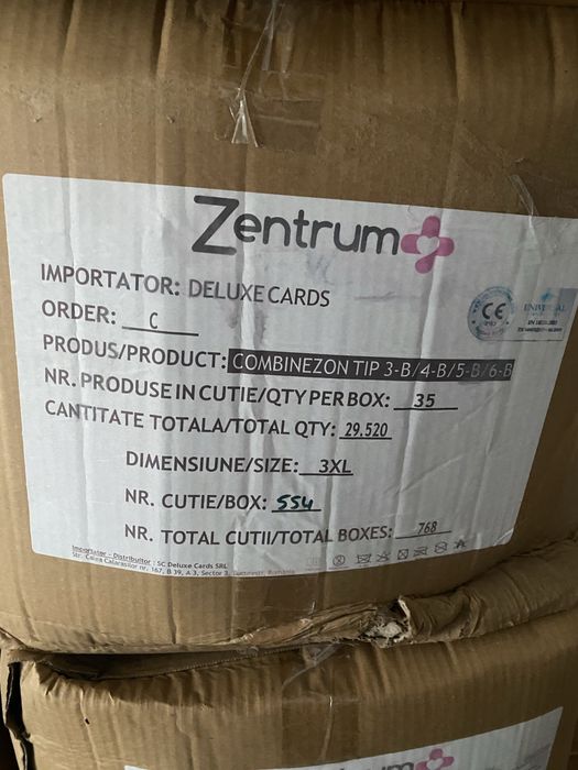 Un bax de conbinezoane cu 35 de bucati