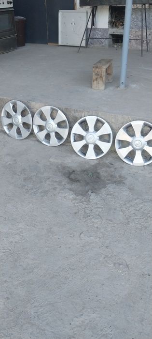 Эшик Нексия 3 чап томон орка.Колпак хам бор оригинал.